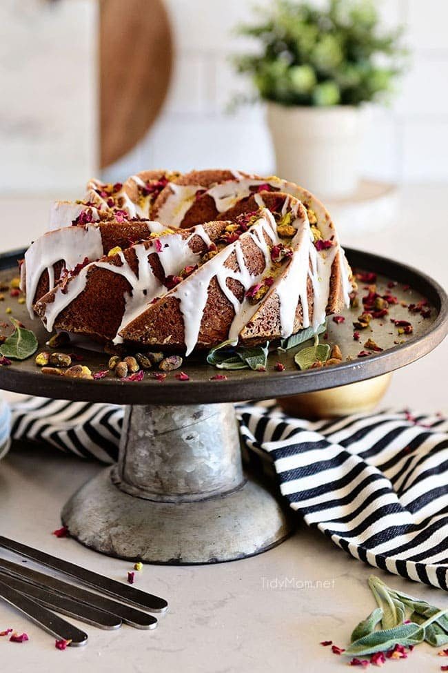 Pistachio Bundt Cake on a gray cake stand