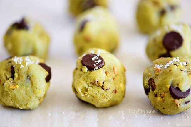 Pistachio cookies are sure to become a favorite! Perfect for St. Patricks Day, Easter, Christmas or any day. These deliciously soft pudding cookies are buttery and salty with dark chocolate chunks that pairs perfectly with chopped pistachios. I bet you can’t eat just one! Get the full printable recipe at cetcu.com