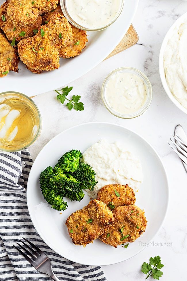 crispy pork medallions with broccoli and mashed potatoes