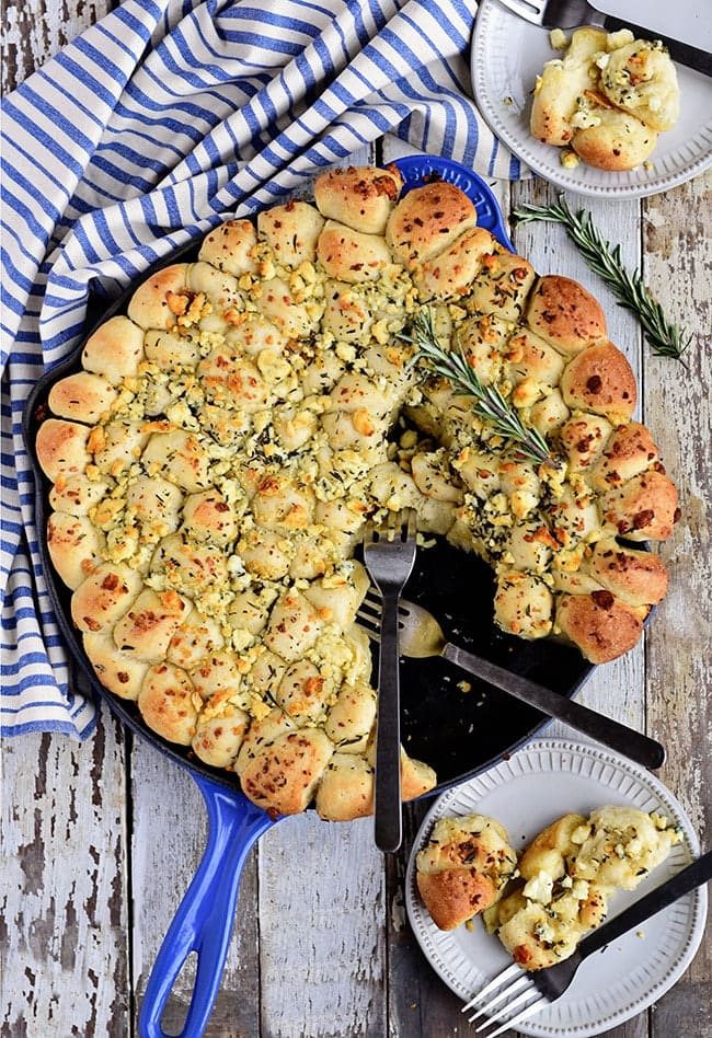 Cheesy Pull-Apart Garlic Bread dished up on plate from skillet