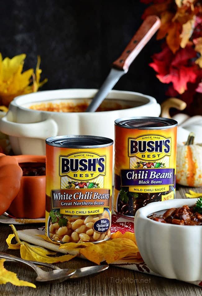 2 cans of chili beans with a pot of chili
