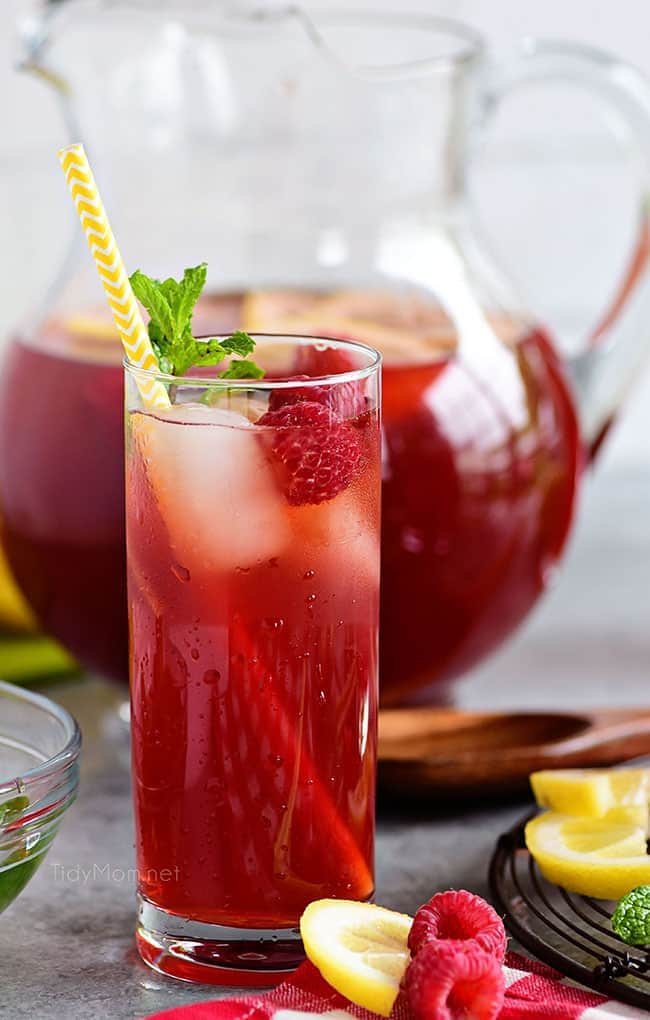 A tall glass of ice cold Red Raspberry Iced Tea