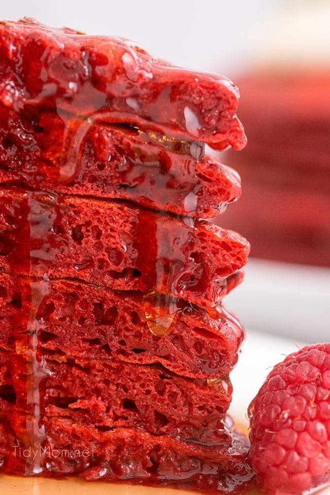 a stack of six red velvet pancakes