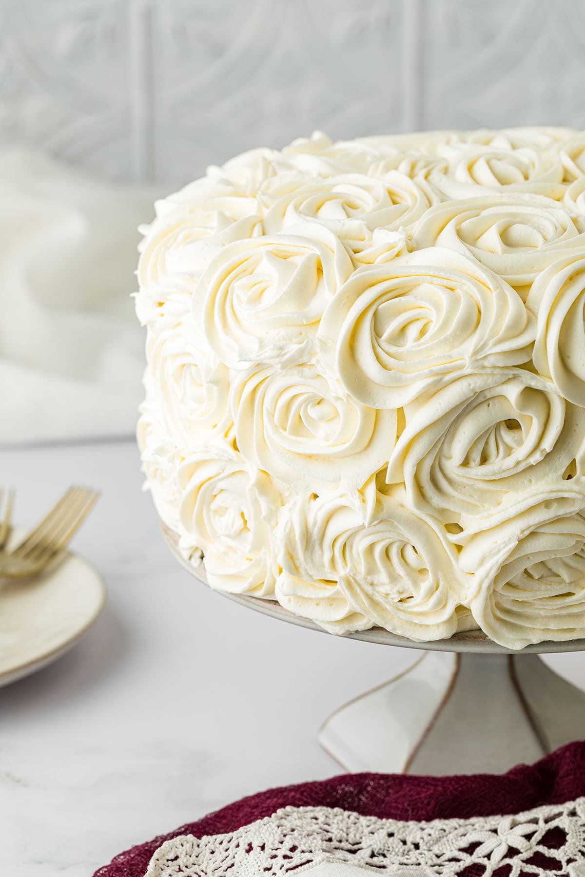 pretty rose cake on a cake stand