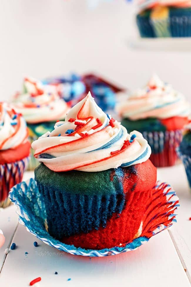 red white and blue cupcake with the wrapper pulled down.
