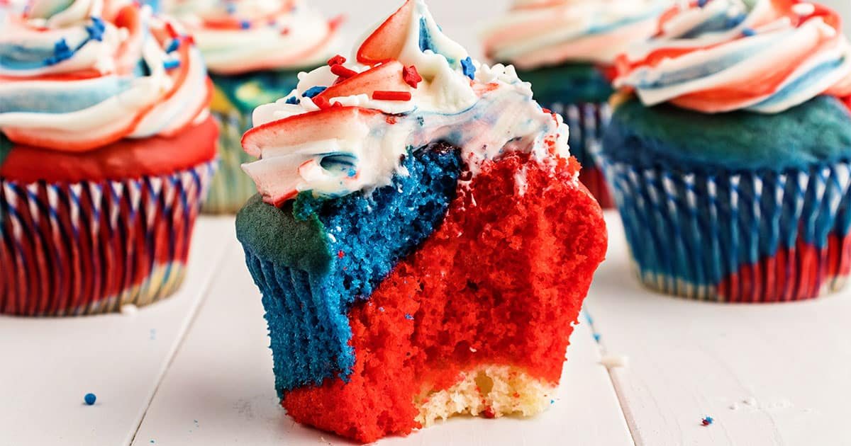 red white and blue cupcake with bite taken out