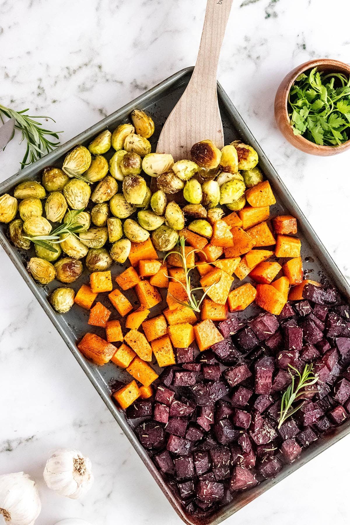 roasted Brussels sprouts Fall vegetables on a baking sheet pan