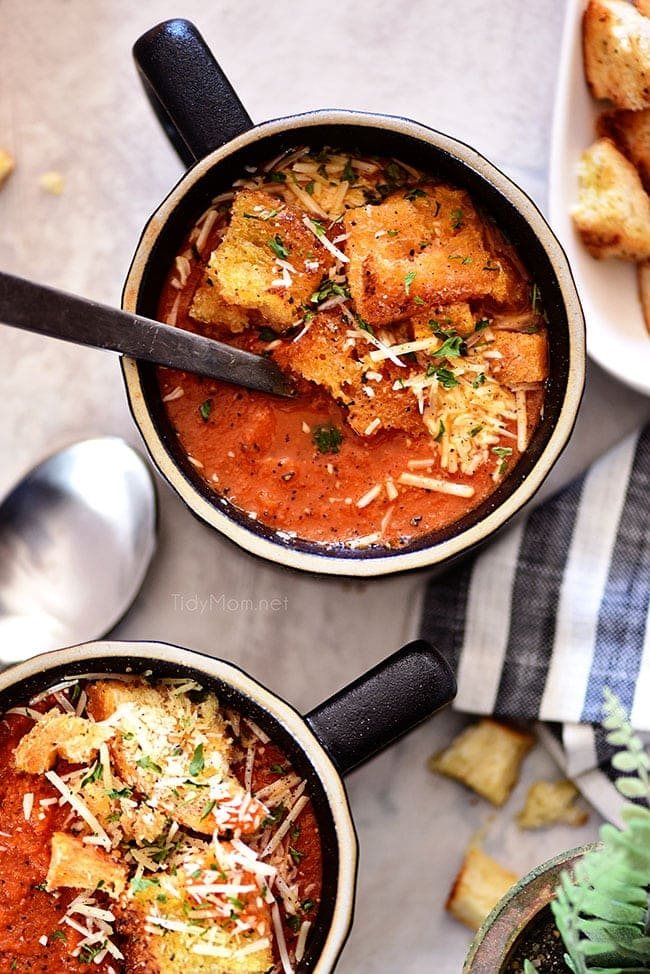 2 bowls of Roasted Tomato Soup in black mugs