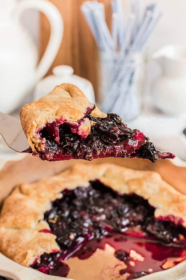 slice of blueberry galette on a pie server
