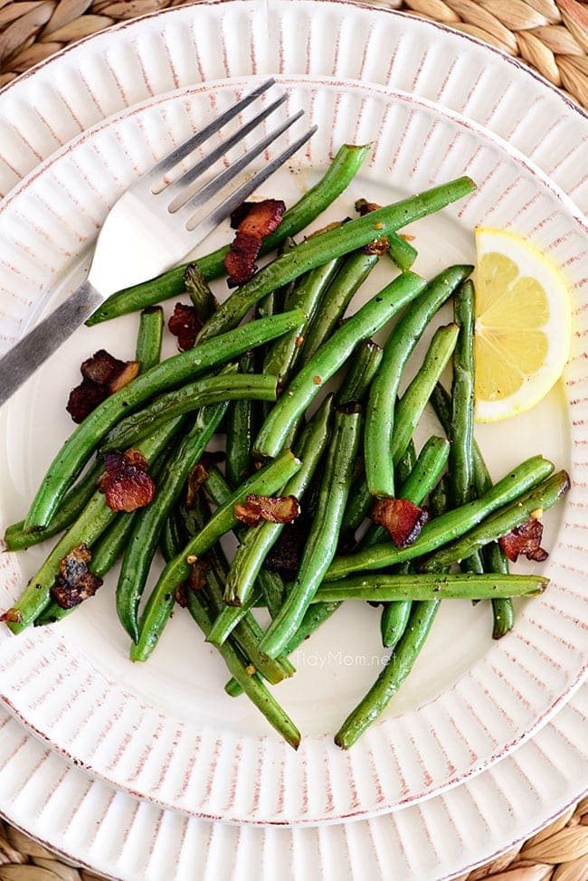 Sautéed Green Beans with bacon and lemon on a plate