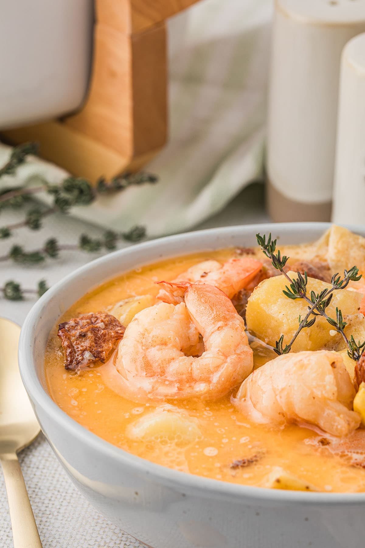 close up of shrimp corn chowder with bacon