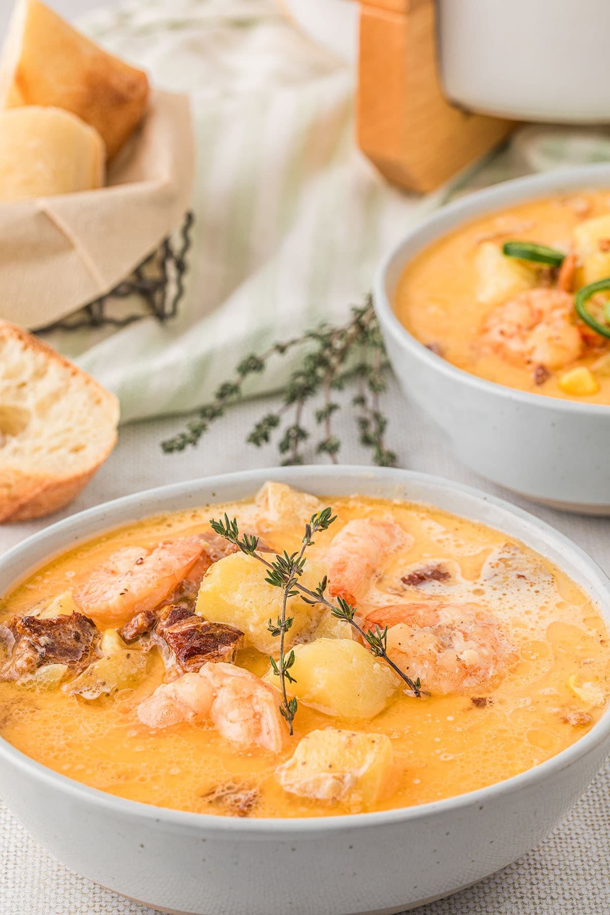 Tasty bowl of chowder on a table