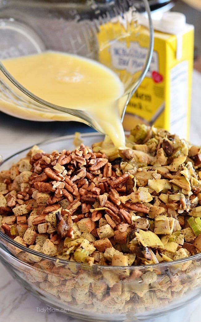 Slow Cooker Stuffing with artichokes, mushrooms and toasted pecans. Easy, flavorful and perfect for any holiday meal. Get the recipe at cetcu.com