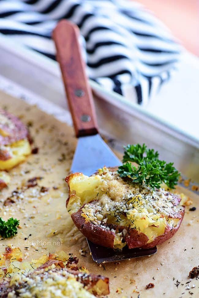 smashed potatoes on a baking sheet
