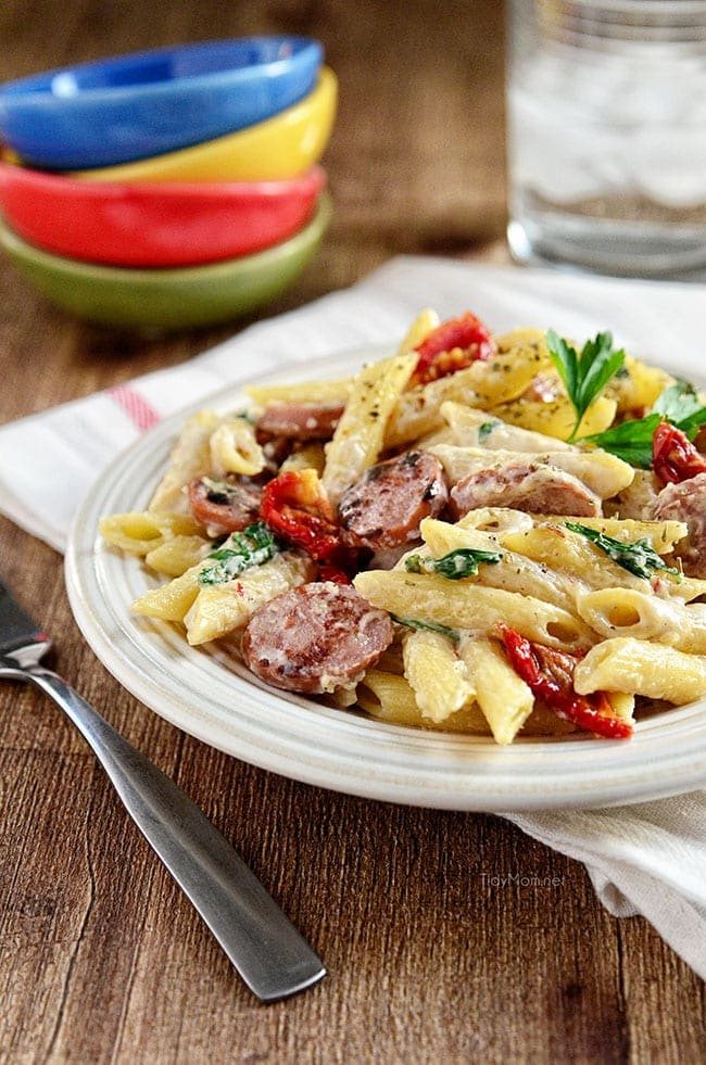 Kicked Up Turkey Sausage Alfredo with spinach and sundried tomatoes. Recipe at cetcu.com