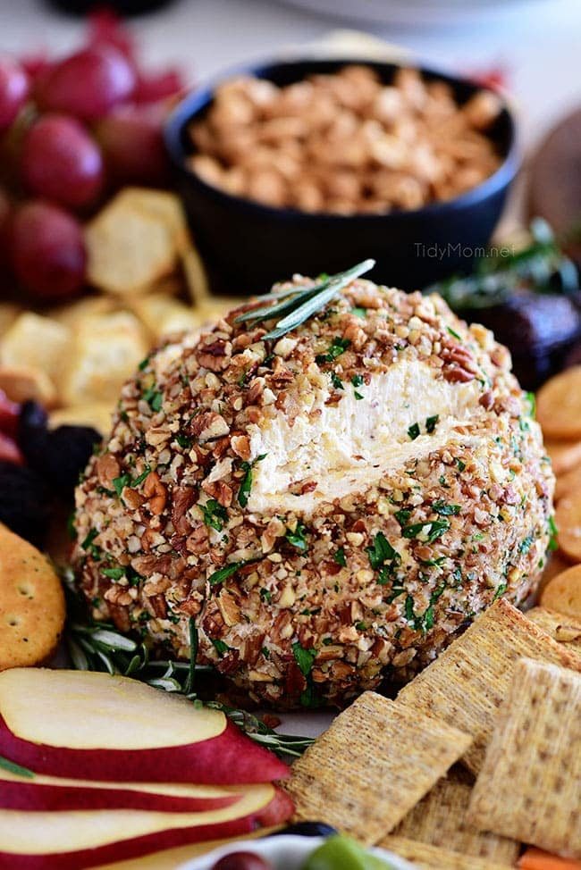 smoky cheese ball on charcuterie board