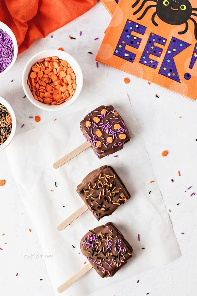 s'mores pops with halloween sprinkles and napkin