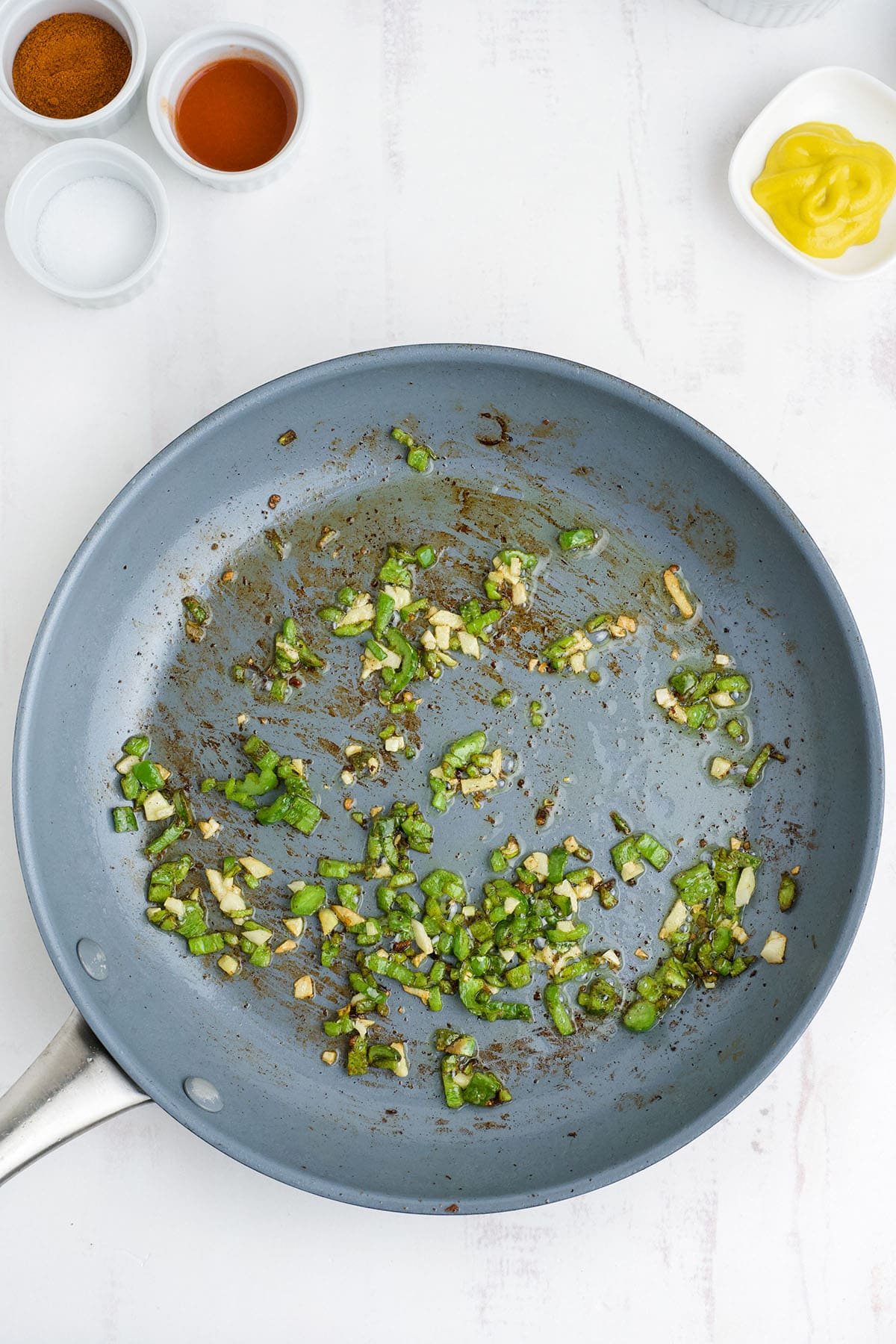 sauteing veggies in a skillet
