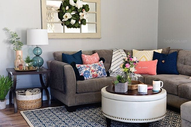 Transition to Spring Family Room Decor. Kick winter to the curb! Bring in the feel of freshness and spring to your home with lots of greenery, flowers and colorful pillows. See the full Spring Family Room Tour at cetcu.com
