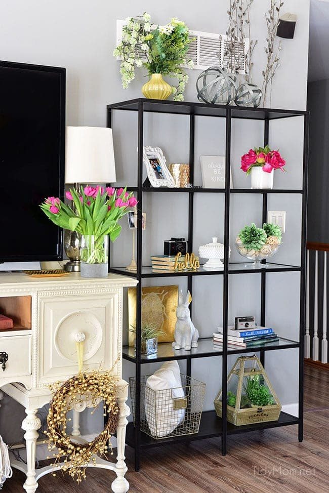 Transition to Spring Family Room Decor. Kick winter to the curb! Bring in the feel of freshness and spring to your home with lots of greenery, flowers and colorful pillows. See the full Spring Family Room Tour at cetcu.com