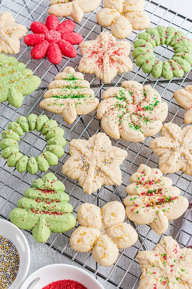 spritz cookies on a wire cooling rack