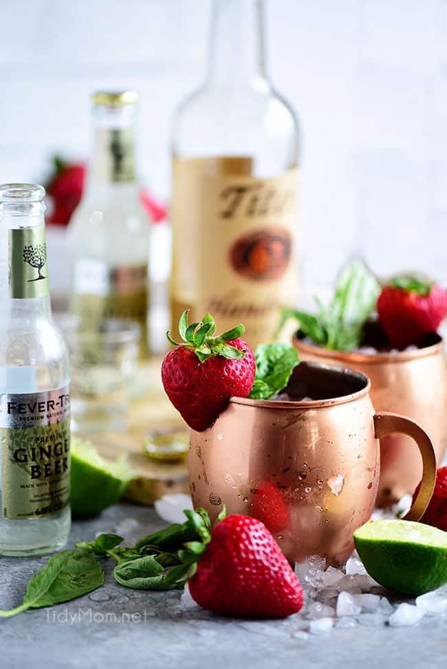 Strawberry Basil Moscow Mule is the perfect summer cocktail. Made like a traditional Moscow Mule with vodka, ginger beer and lime, with the addition of muddled fresh juicy strawberries and basil. Print the recipe at cetcu.com Delicious!
