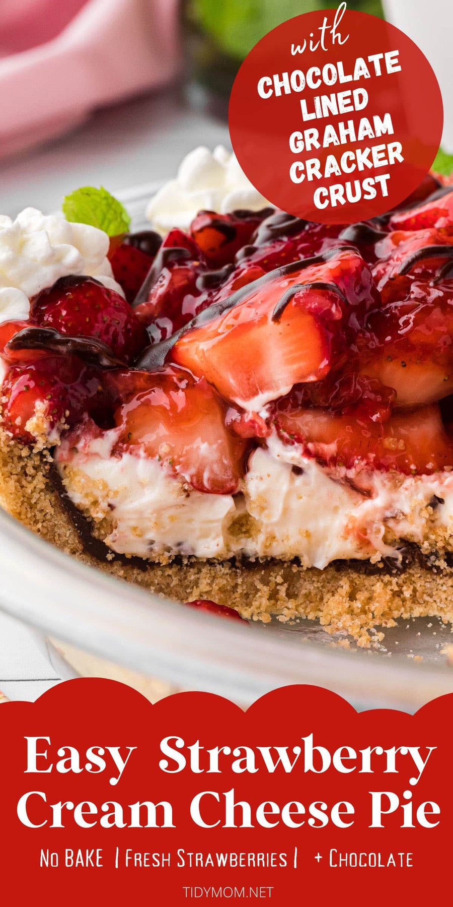 close up of cut strawberry pie in a white pie dish
