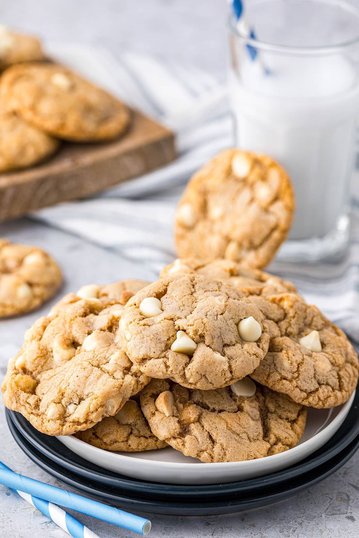 a plate of cinnamon sugar cookies with white chocolate chips