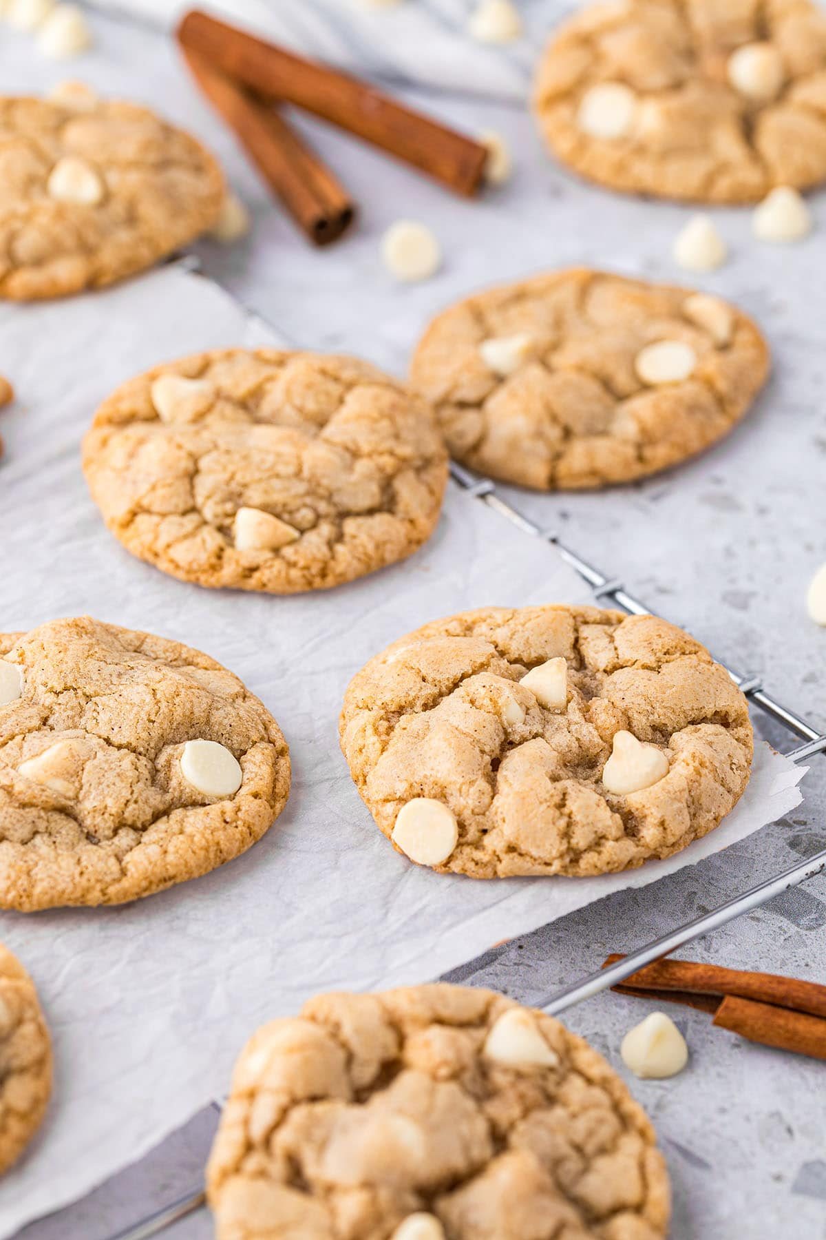 cinnamon sugar cookies with white chocolate chips on parchment paper