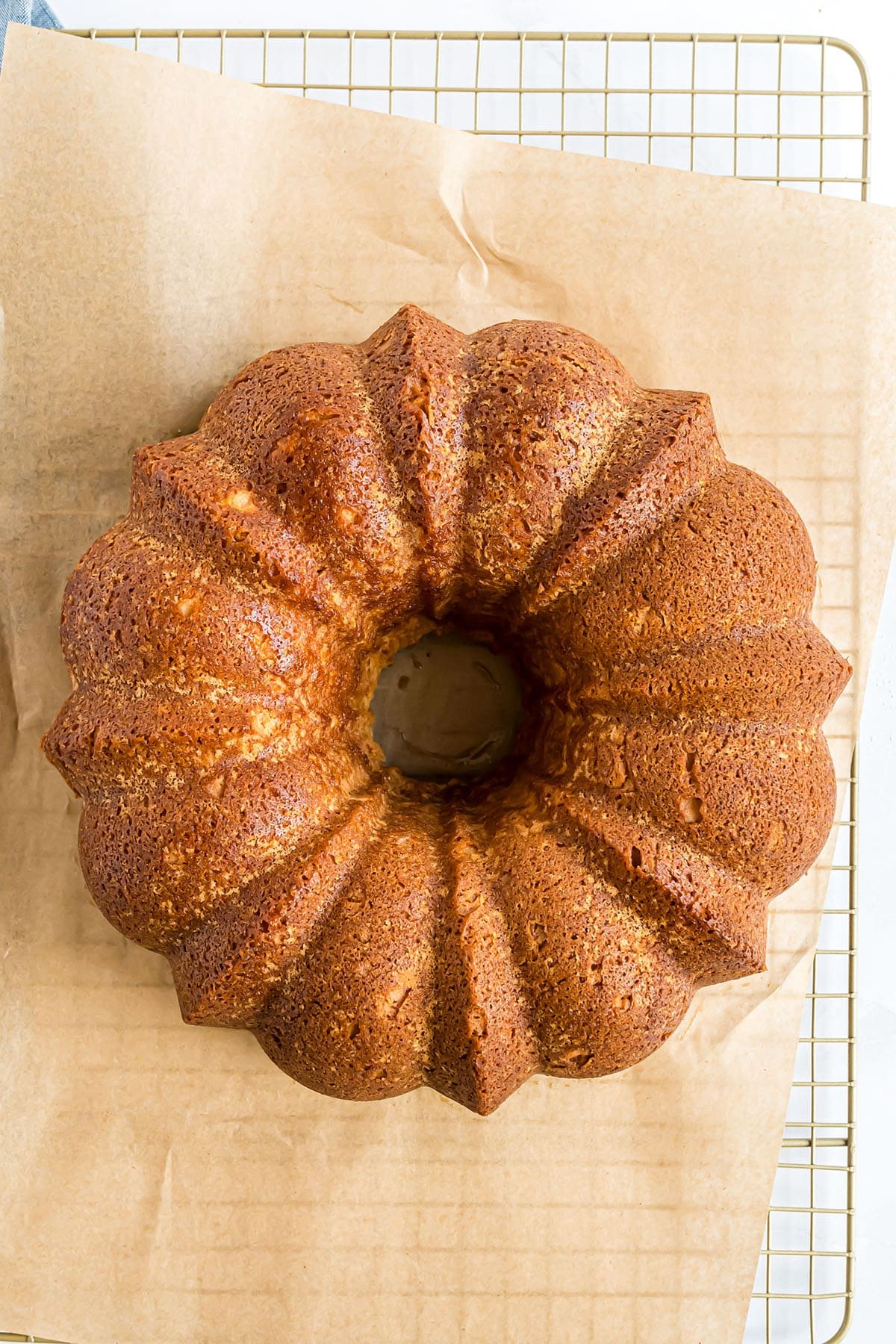pound cake cooking on a wire rack