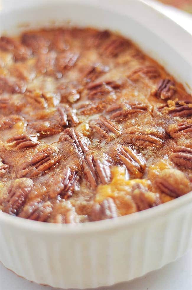 Pecan Topped Sweet Potatoes from Your Homebased Mom: The Ultimate Thanksgiving Menu Plan from make-ahead slow cooker turkey and peacan topped sweet potatoes to cranberry appetizers and pumpkin creme brulee. You’ll find family favorite Thanksgiving recipes that will have them coming back for more!! Get all the Thanksgiving Menu Recipes at cetcu.com