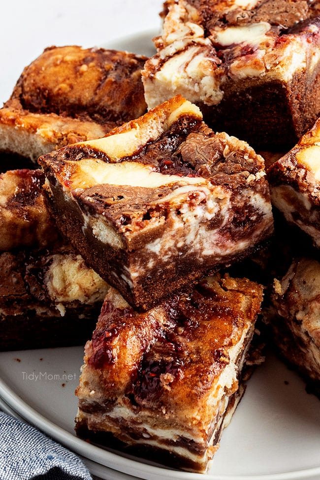 Tiramisu Brownies cut and stacked on a plate