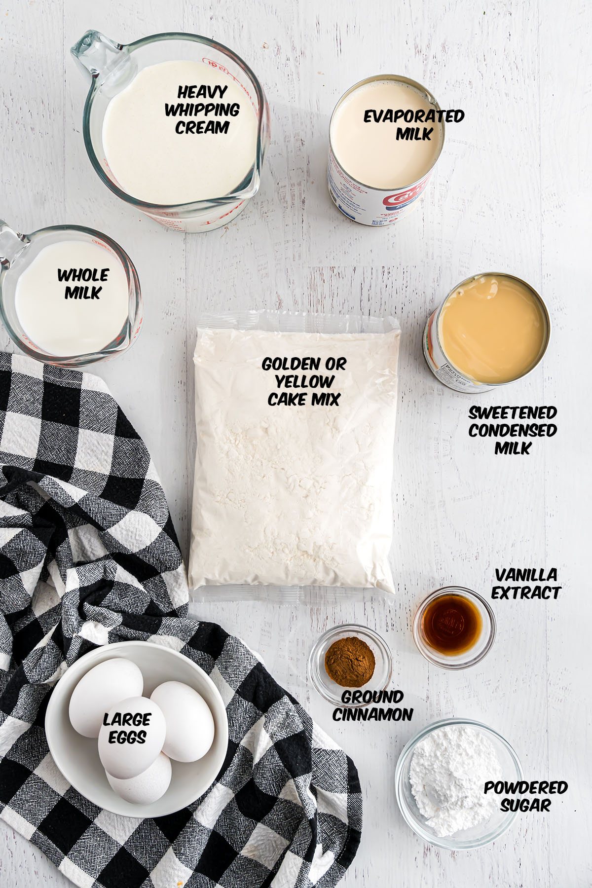 ingredients for easy tres leches cake made with a box cake mix