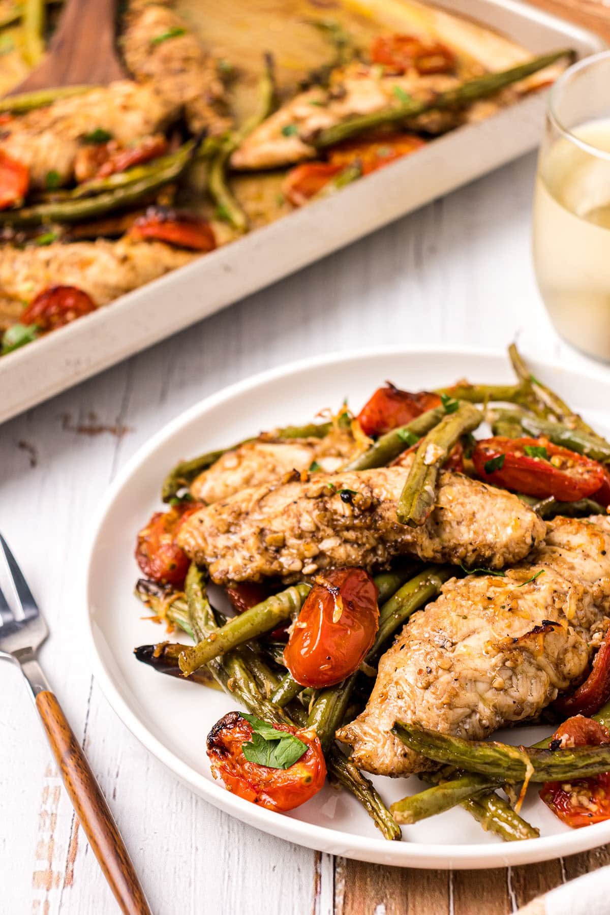 Tuscan chicken plated with fresh veggies