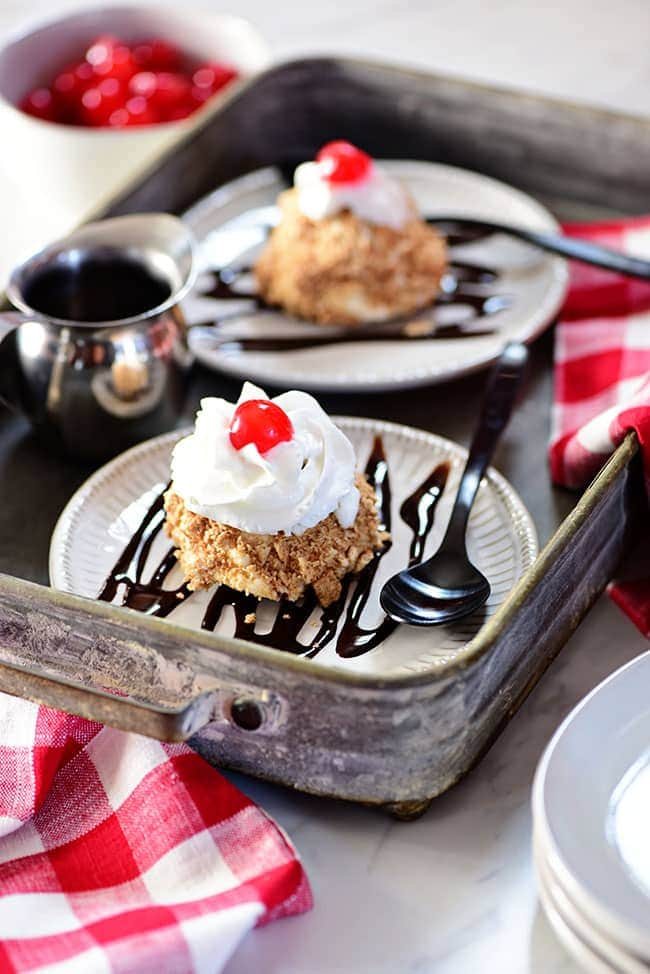 Two servings of fried ice cream on a tray