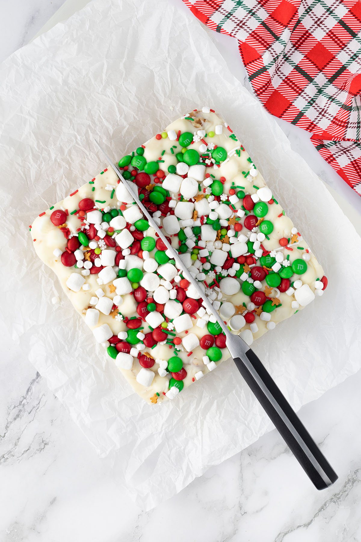 cutting Christmas fudge