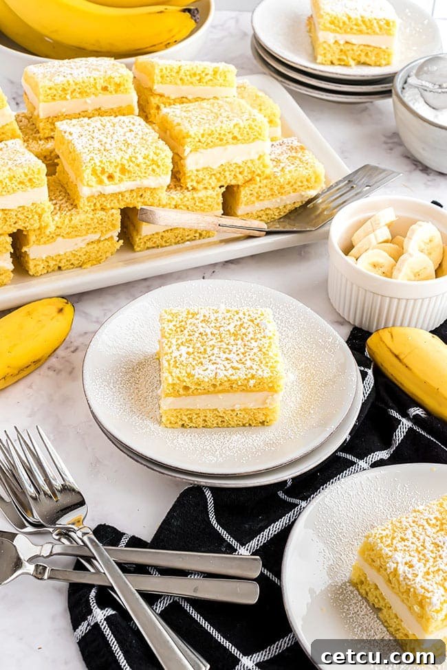 Servings of Old Fashioned Banana Flips on plates, presented beautifully on a table with a black napkin