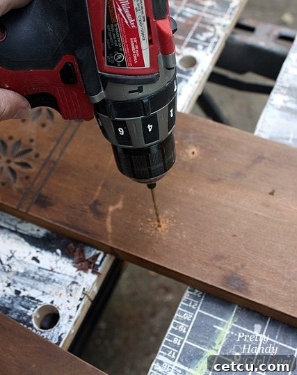 Pre-drilling screw holes on the back panel for shelf attachment