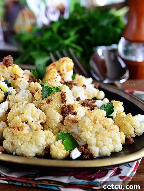 Roasted Cauliflower with browned butter crouton crumbs on a plate