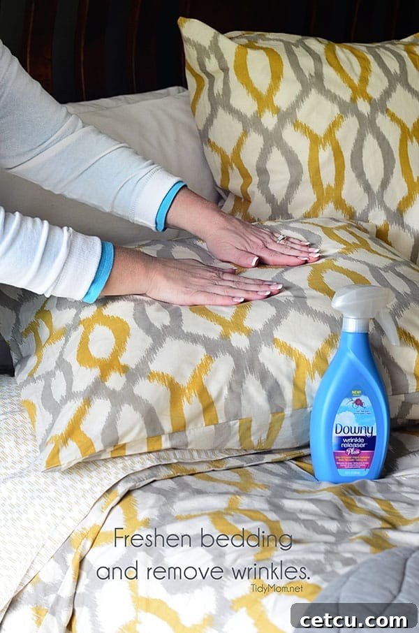 Freshen bedding and remove wrinkles with Downy Wrinkle Releaser Plus. Learn more at TidyMom.net #wondermoms