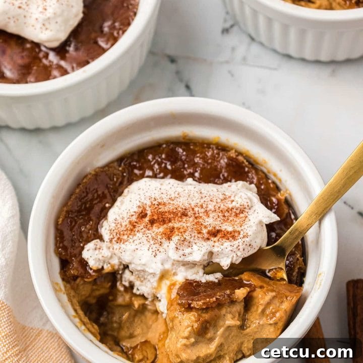 Pumpkin Crème Brûlée in a white ramekin, topped with perfectly caramelized sugar.