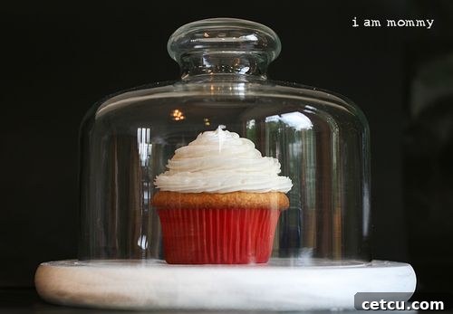 After: A beautifully styled dessert table featuring a DIY cake stand displaying a cake and cupcakes