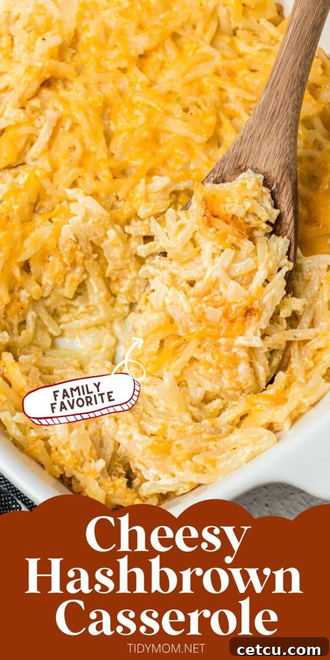 Loaded Cheesy Hashbrown Bake 11 cheesy hashbrown potato casserole in a baking dish with a wooden spoon