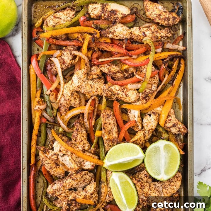 Delicious sheet pan fajitas with chicken and bell peppers, ready to be served.