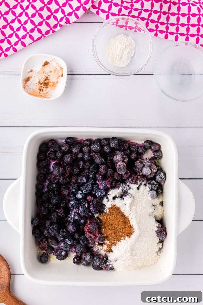 mixing a berry crisp right in the pan