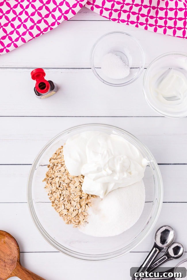 berry crisp topping with oats in a glass mixing bowl