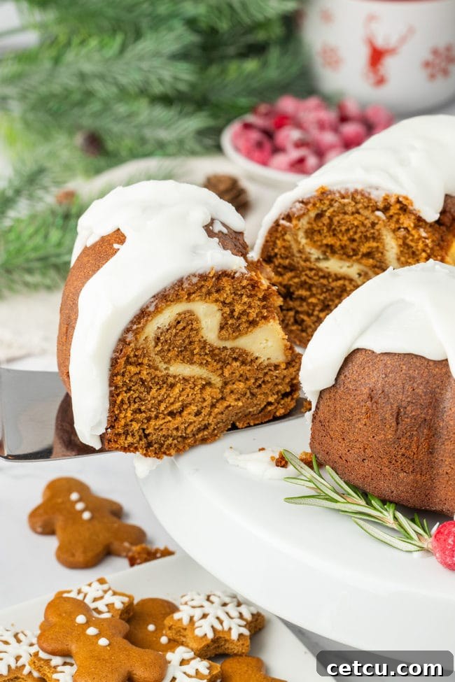 cutting a piece of Gingerbread Bundt Cake