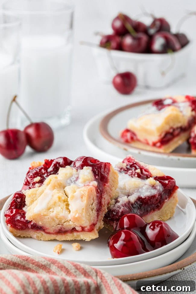 cherry pie bars with pie filling on a plate