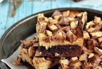Peanut Butter Swirled Snickers Cheesecake Brownies