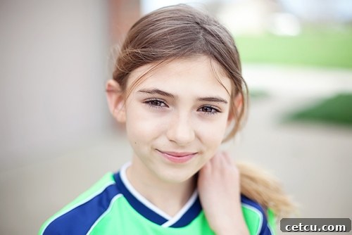 Portrait of daughter in open shade with soft, even lighting and natural expression
